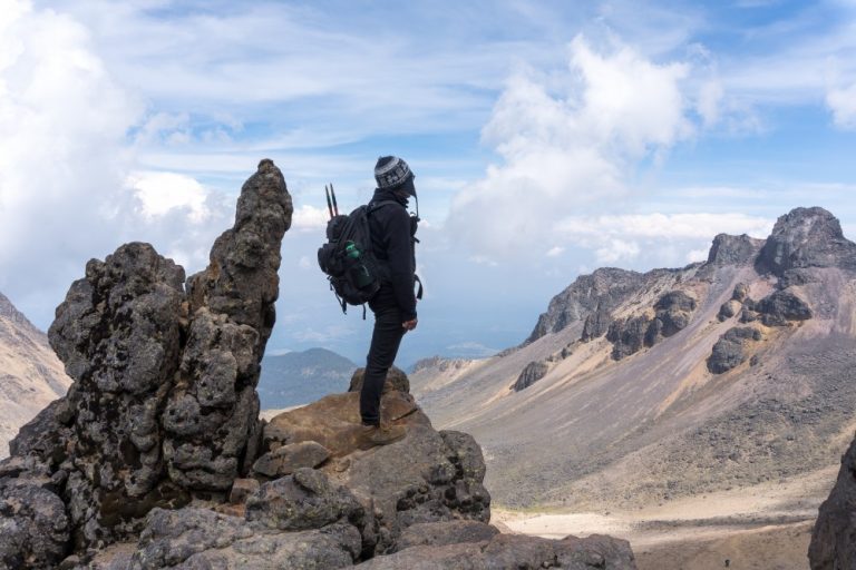 back-view-hiker-with-backpack-top-iztaccihuatl-volcano